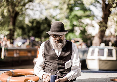 Old man drinking coffee